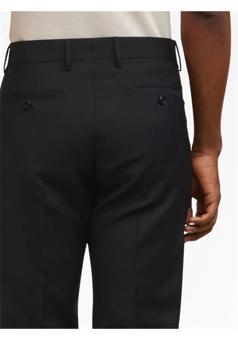 Black pleat-detail tapered chino trousers - men AMI PARIS | HTR004WV0028001